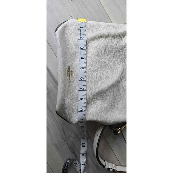 COACH® PT | Evelyn Shoulder Bag With Quilting And Charm  Coach White Pebbled Leather Shoulder Bag